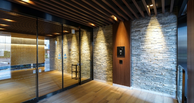 Wood grain entrance that peacefully welcomes residents